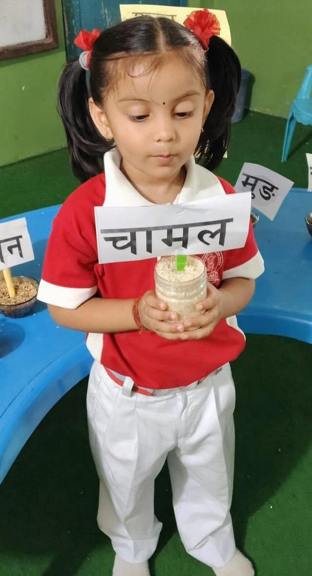 Pre-primary student learning about grains at Namuna English Awasiya Bidhyalaya, Rautahat Nepal